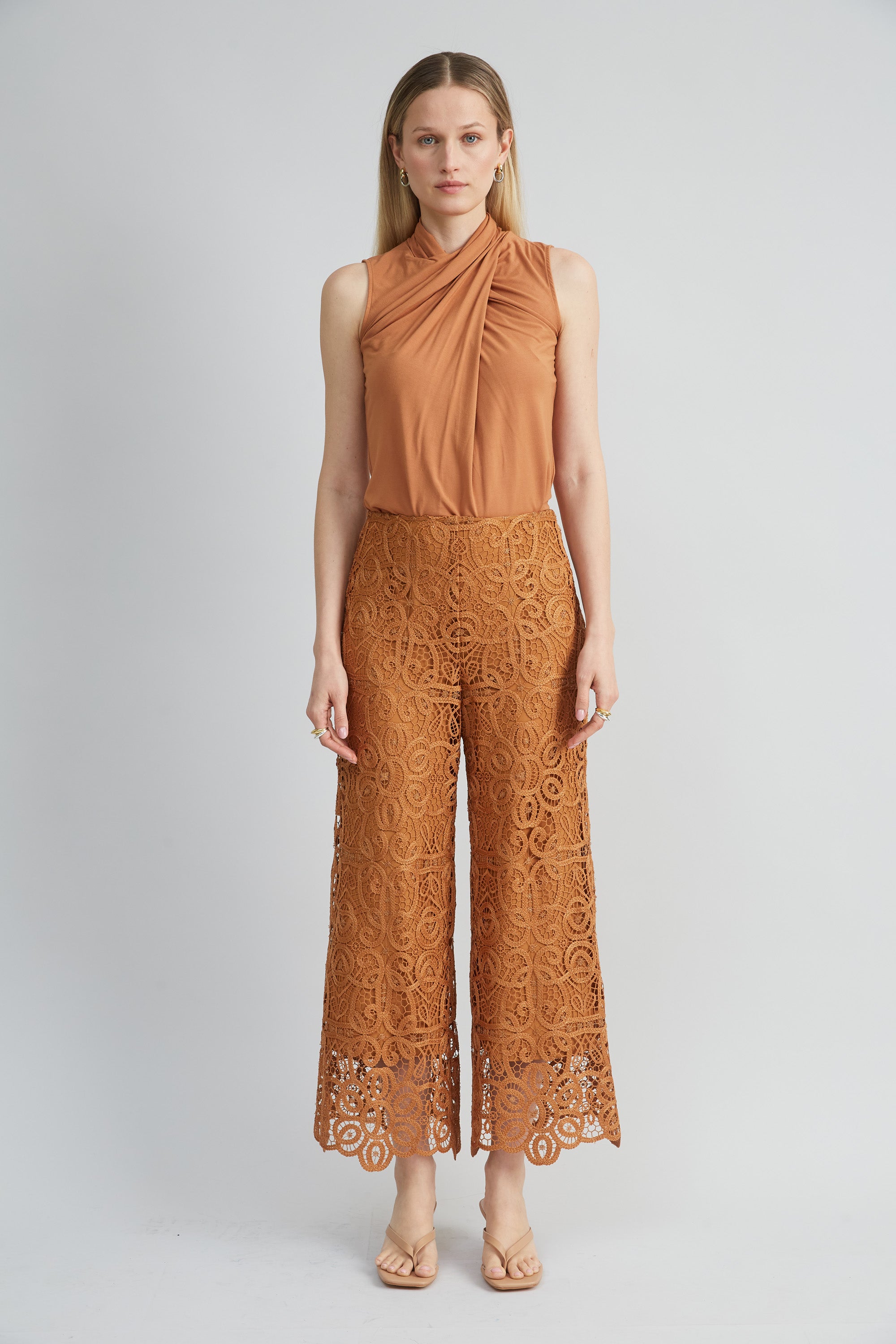 Sleeveless Twist Neck Knit