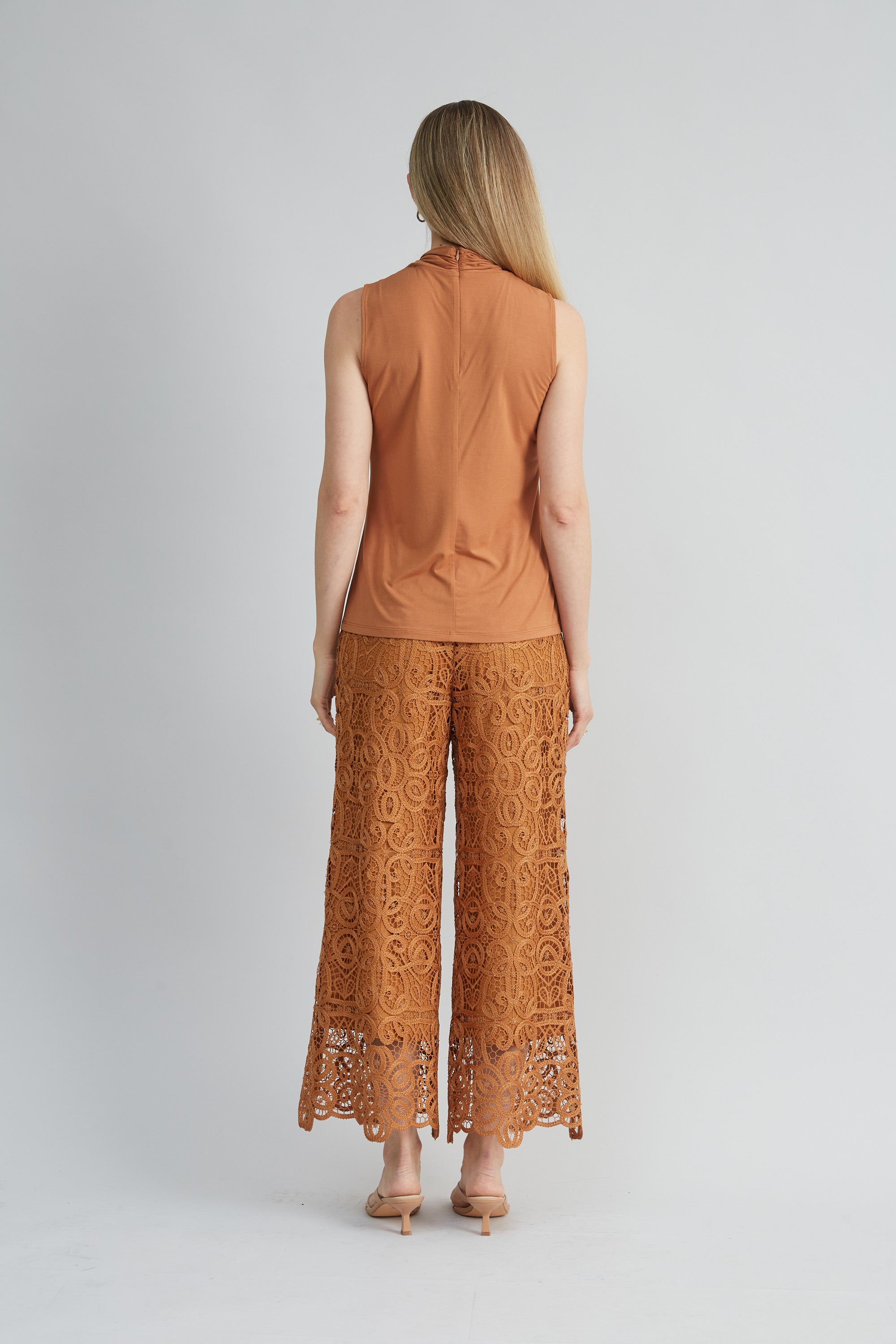 Sleeveless Twist Neck Knit